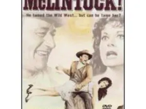 Vintage Western film poster with cowboy and woman