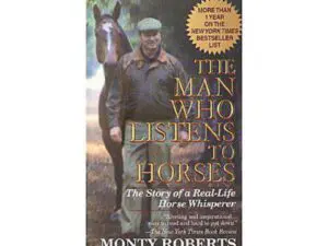 Book cover showing a man standing with horse