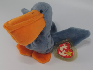 Blue plush pelican with orange beak, TY tag