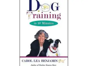Dog training book cover with woman and dog