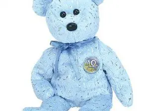 Light blue plush teddy bear with 10 badge