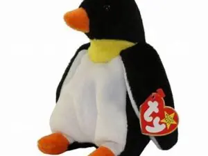 Black and white plush penguin toy with tag