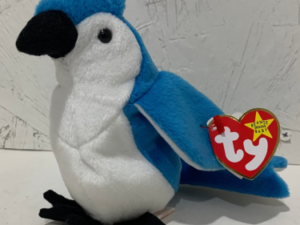 blue and white plush parrot with Ty tag