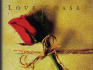 Red rose tied with twine on book cover