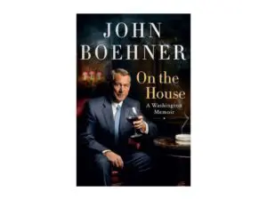 Politician seated with wine on memoir cover