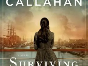 Woman in Victorian dress overlooking harbor at sunset