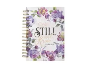 Floral spiral notebook with "Be Still and Know