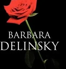 A red rose is shown on the cover of barbara delinsky 's book.