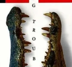 A book cover with two alligator feet and the title " big trouble ".