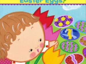 Baby reaching for colorful patterned Easter eggs