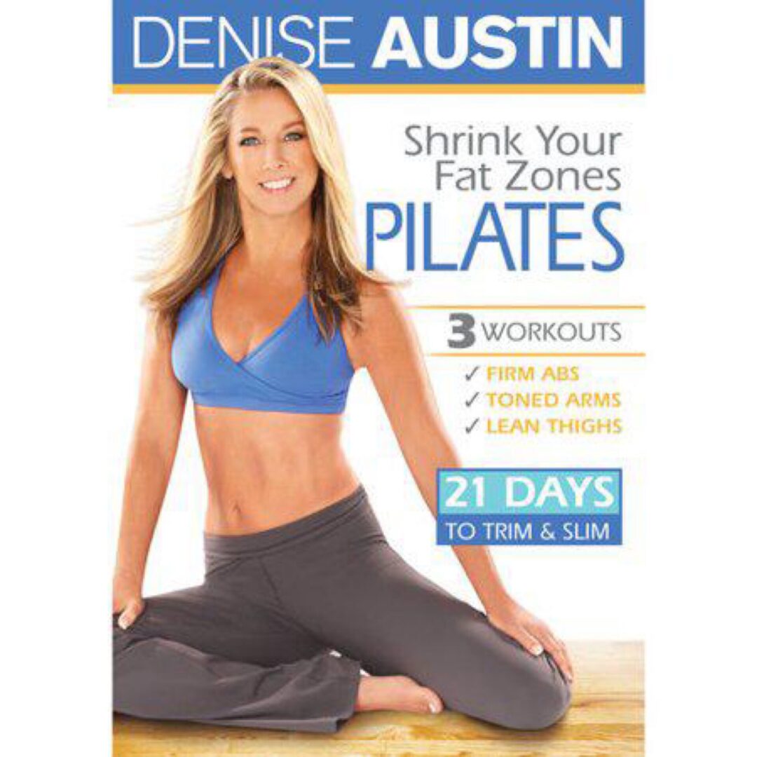 Smiling fit woman seated pilates pose