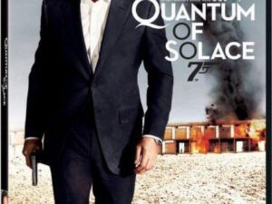 Movie poster: man in suit holding gun