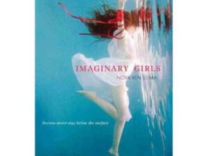 Girl in white dress underwater with red ribbon