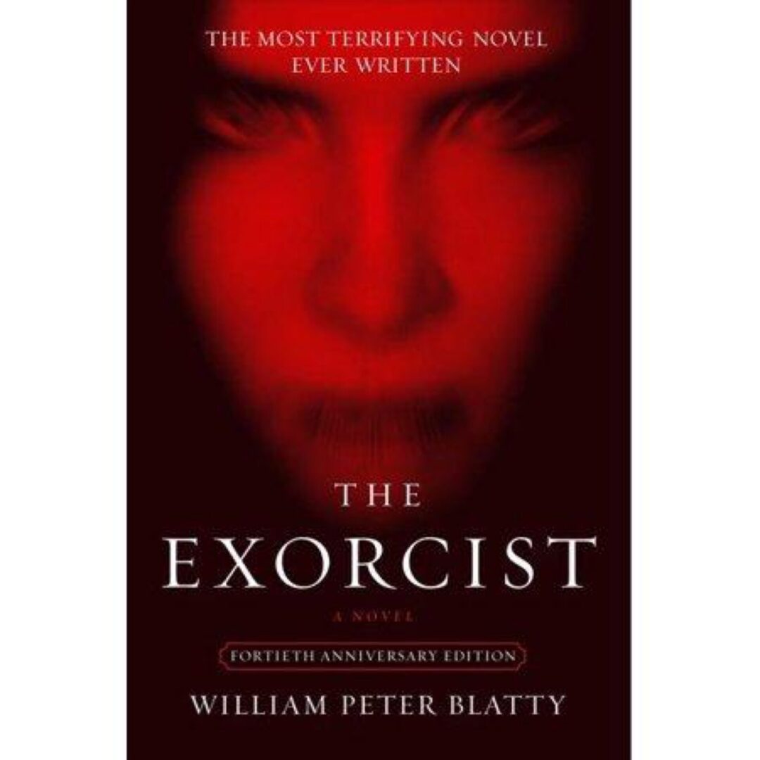 The Exorcist novel cover, red haunting face