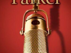 Vintage gold microphone against red background