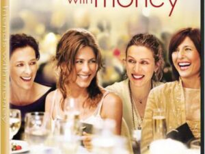 Four women laughing at elegant dinner table