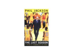 Book cover: basketball coach surrounded by players
