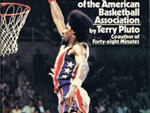 Basketball player dunking on vintage ABA cover