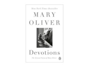 Monochrome book cover titled "Devotions" with hands