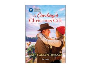 Cowboy and woman embracing on Christmas book cover