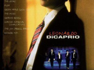 Young man in suit on stylized movie poster