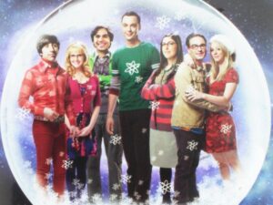 Group of seven people in holiday snow globe