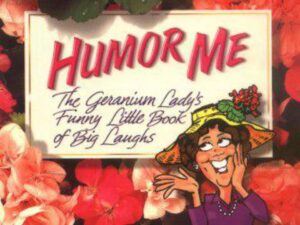 Humor Me book cover: geraniums and cartoon woman