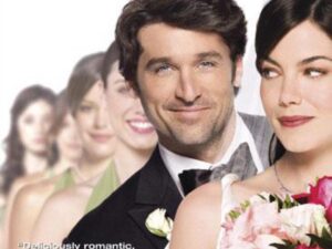 Bride and groom with bridesmaids and bouquet