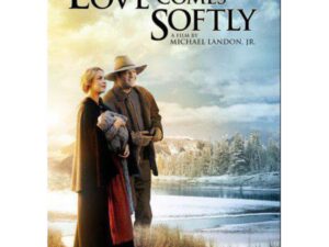 Romantic couple in period clothing by snowy lake