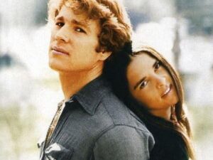 Young couple leaning back-to-back, romantic poster